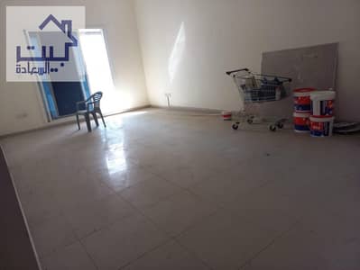 Apartment for rent in Ajman Al Rashidiya3, on Khalifa Street, large area, closets in the wall, with parking and free air conditioning