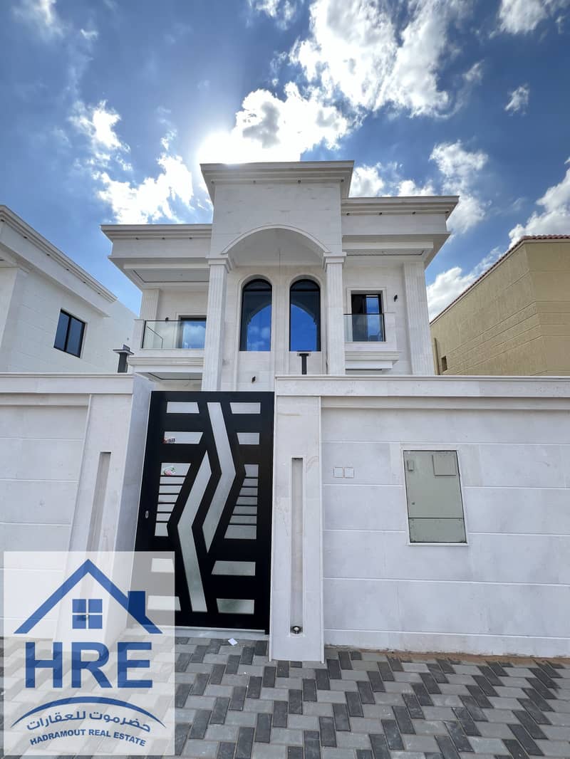 For sale, a classic villa in Ajman, Al Rawda 2 area, close to all services, and the second piece of Al Qar Street, super deluxe finishing