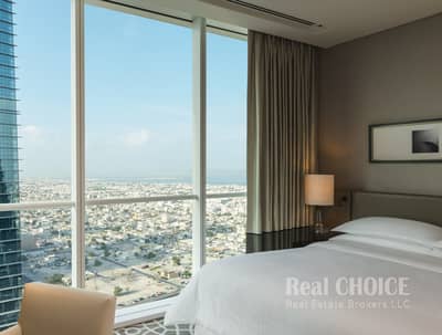 شقة فندقية 2 غرفة نوم للايجار في شارع الشيخ زايد، دبي - Sheraton Grand Hotel, Dubai - Two Bedroom Apartment. jpg