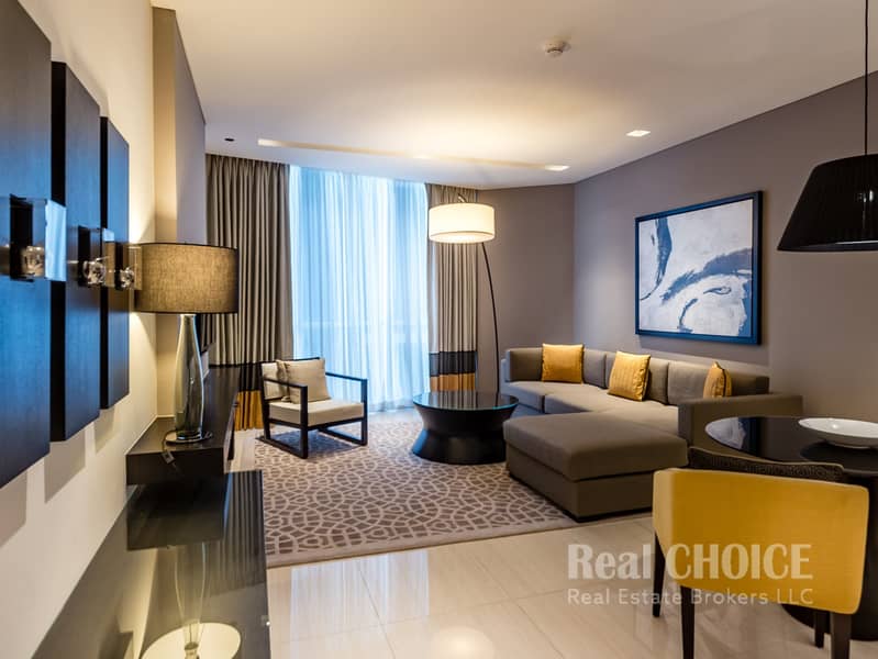 2 Sheraton Grand Hotel, Dubai - 1 & 2 Bedroom Living Room. jpg