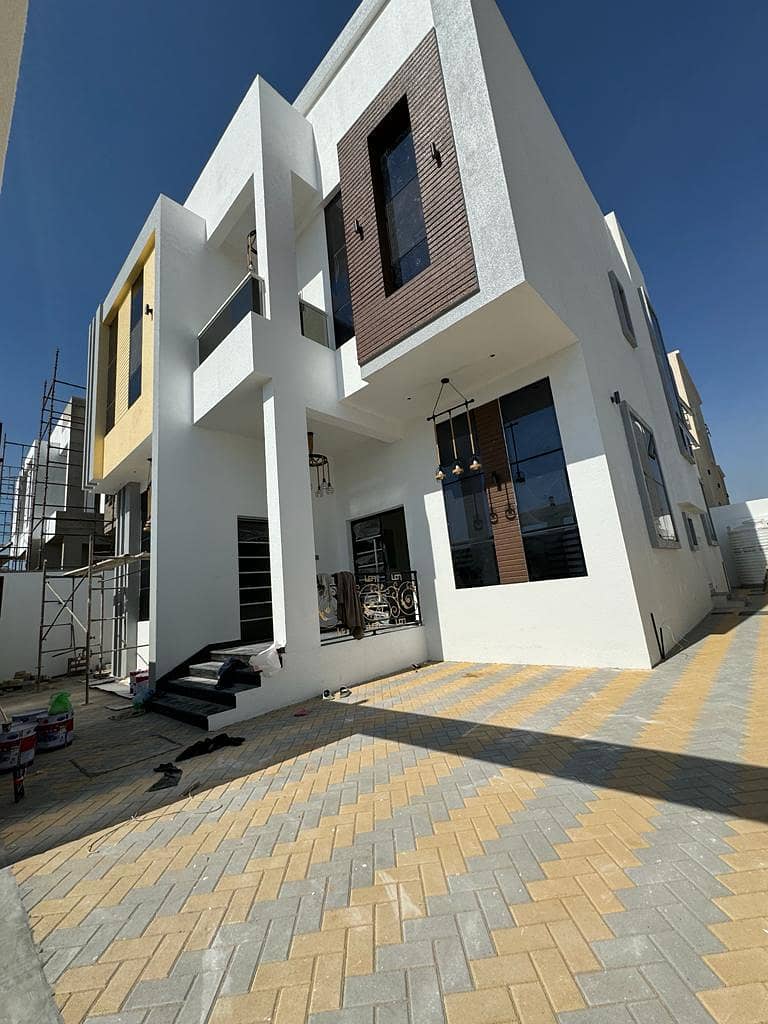 Villa for rent in Ajman, Al Helio area New, first inhabitant 5 rooms, a sitting room and a hall 85 thousand dirhams are required