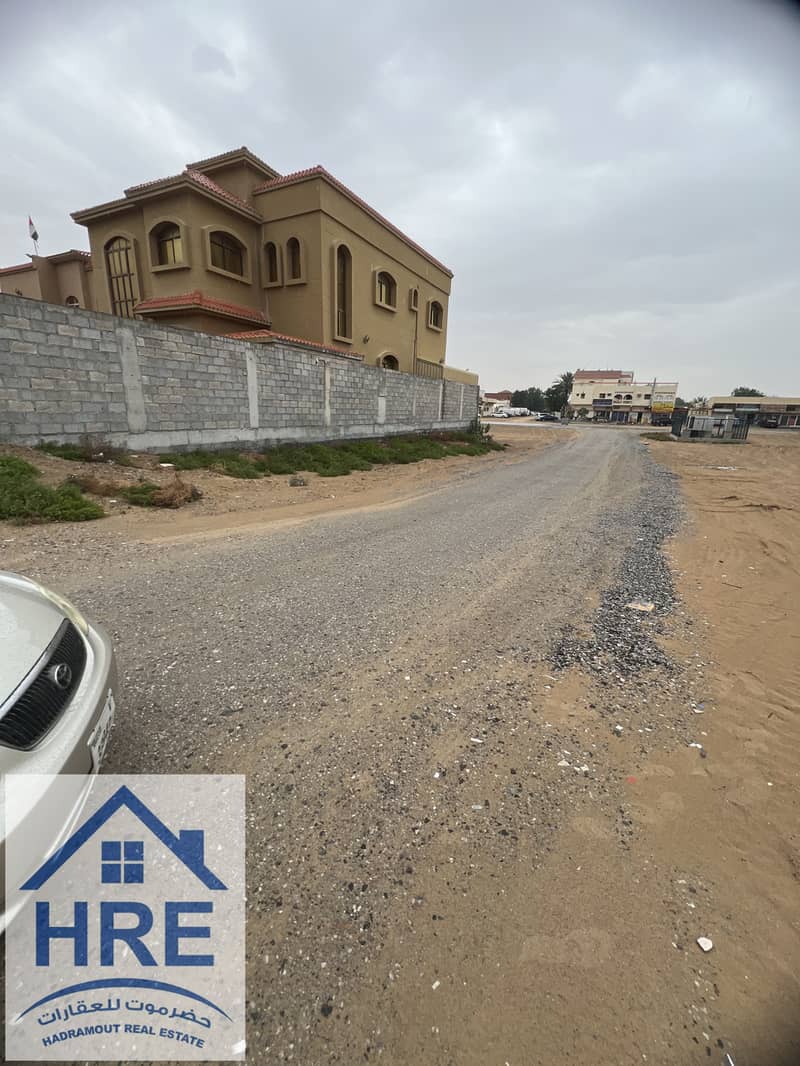 For sale, residential investment land, villas in Ajman, Al Mowaihat 2 area, close to schools, Ajman Academy, Sheikh Ammar Street