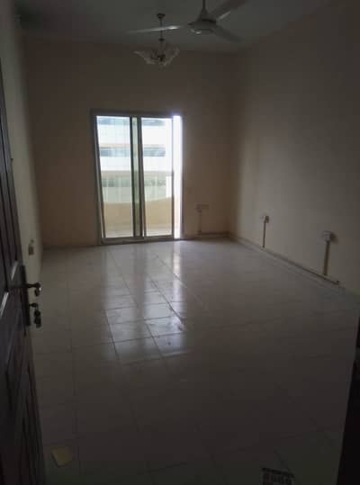 For annual rent in Ajman, a room, a hall, a kitchen and a bathroom in Al Rashidiya 3, next to Amina Hospital, close to all services and easy entry and