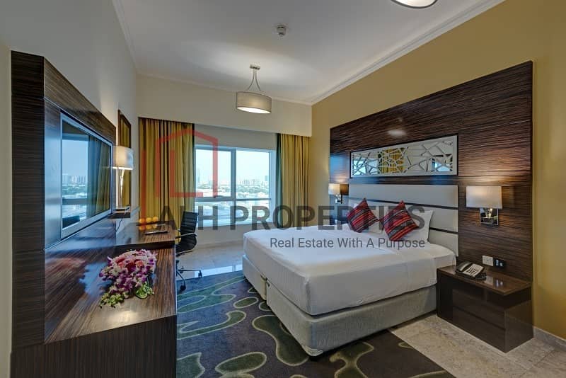 شقة فندقية في فندق فينتاج جراند،مدينة دبي للإنتاج 1 غرفة 98000 درهم - 8593728