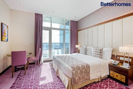 شقة فندقية  للايجار في الخليج التجاري، دبي - شقة فندقية في رويال كونتيننتال للاجنحة الفندقية،الخليج التجاري 97500 درهم - 8382158