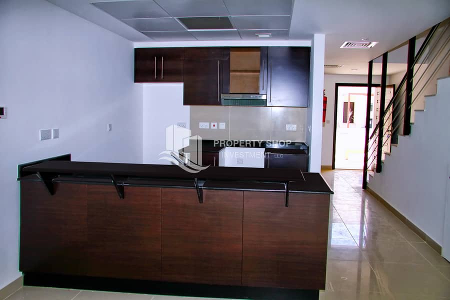 8 2-bedroom-villa-abu-dhab-al-reef-arabian-village-kitchen. JPG