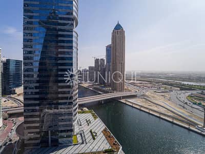 Office for Sale in Business Bay, Dubai - High Floor | Canal View | Fully Fitted and Vacant