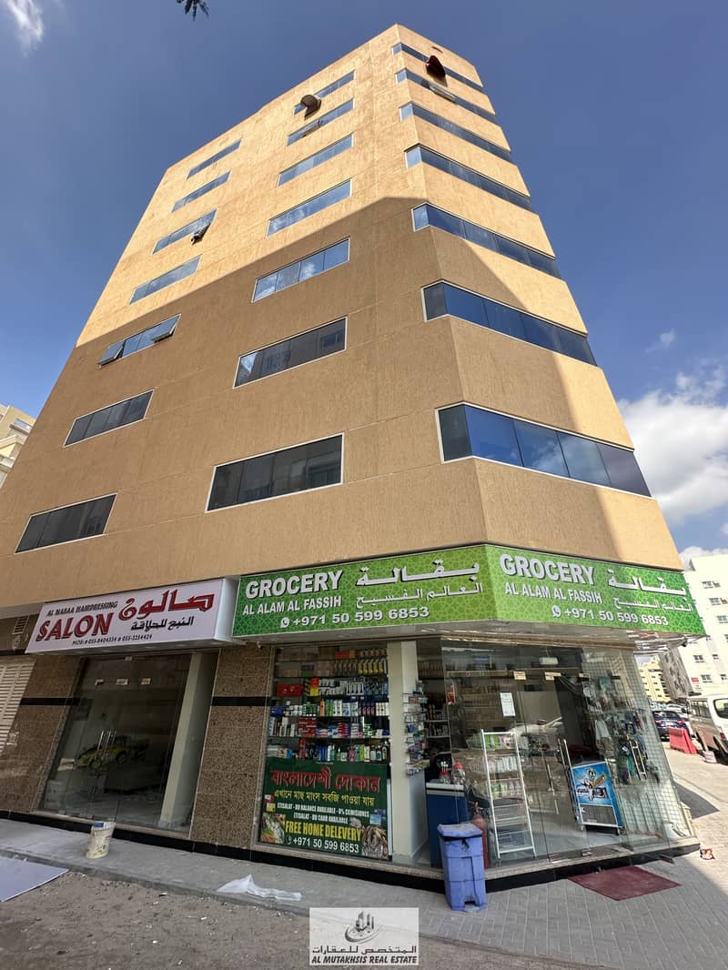 For sale, a new building in Al Butina area, Sharjah It is rented and has an annual income of 750 thousand dirhams The building consists of ground + 7 floors It has 42 apartments + 3 shops
