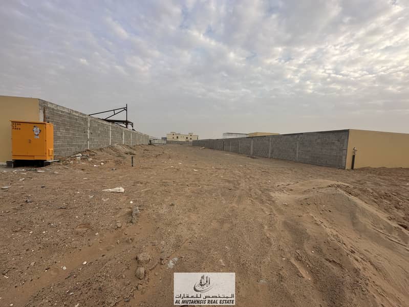 For sale, industrial land in Al-Saja’a, Sharjah, owned by all Arab nationalities, an area of ​​6,000 feet on an asphalt road, ready for construction.