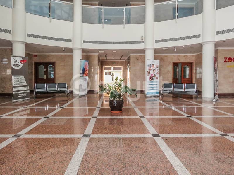 A kiosk for rent in the entrance of the REMAL Mall Duba