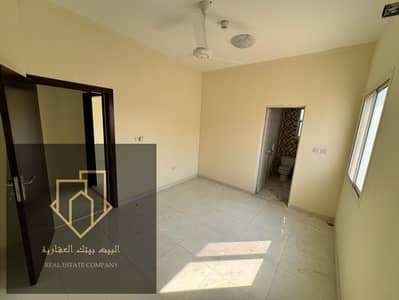 For annual rent in Ajman, Umayhat area, two master rooms, a hall, 3 bathrooms, a very large area