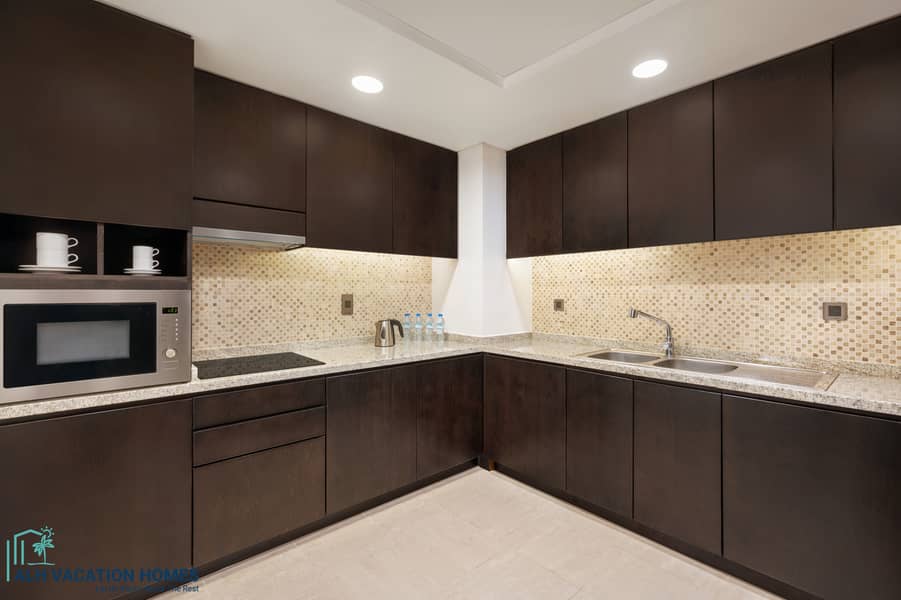 6 Family Three Bedroom Palm View Apartment - Fully Equipped Kitchen. jpg