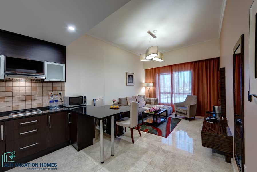 3 Ghaya Grand Hotel Dubai  - One Bedroom Living Room. jpg