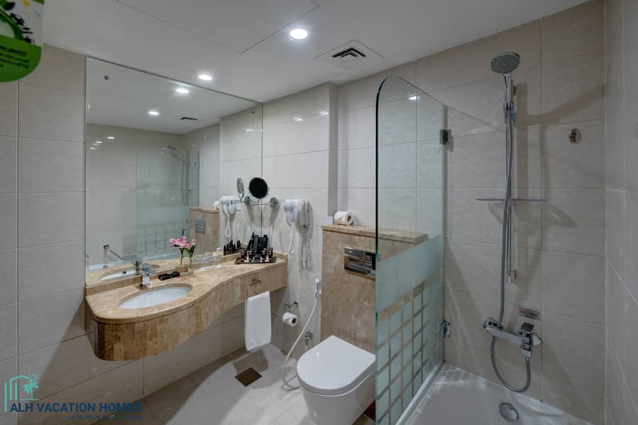 5 Ghaya Grand Hotel Dubai  - One Bedroom Bathroom 5. jpg