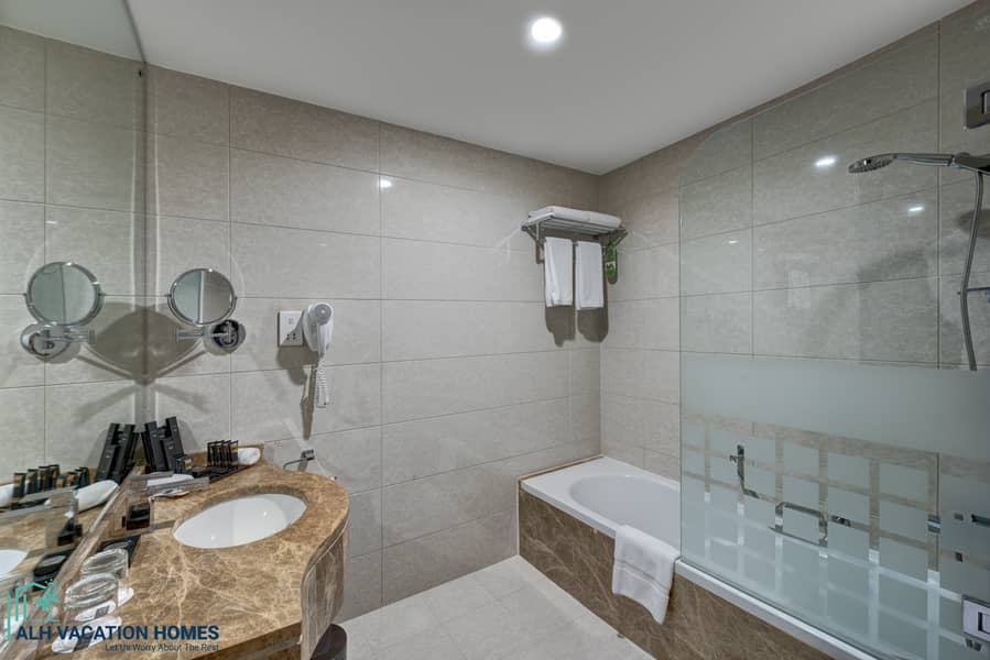 7 Ghaya Grand Hotel Dubai- Studio Bathroom 3. jpg
