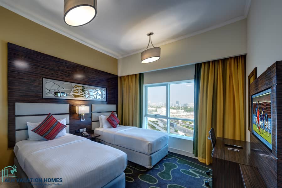 9 Ghaya Grand Hotel Dubai - Two bedroom Twinroom  1. jpg