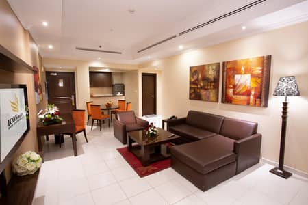 1 Bedroom Hotel Apartment for Rent in Al Barsha, Dubai - Living room. jpeg