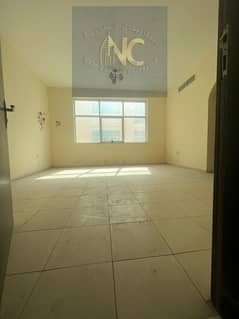 A room and a hall for annual rent in Al Jurf, in a prime location close to Ajman University