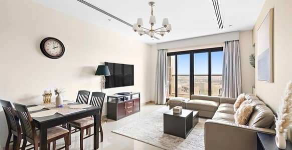 فلیٹ 1 غرفة نوم للايجار في وسط مدينة دبي، دبي - Living room