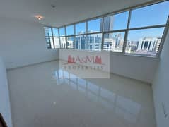 Spacious Three-Bedroom Retreat: Balcony, Built-in-Wardrobes, Maid's Room, and Basement Parking Included in Hamdan Street for AED 90,000 Only. . !!