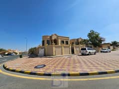 Two-storey villa for sale in Al Hamidiya 1 area in the Emirate of Ajman, corner of two Qar streets, with an area of 6,450 square feet, 6 years old