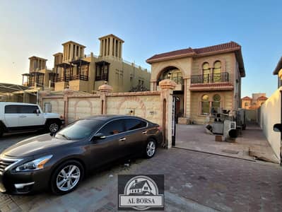 5 Bedroom Villa for Sale in Al Rawda, Ajman - Villa for sale in Al-Rawda 3 on the asphalt street, the first resident, with the building standing for a period of time due to the difference in hei
