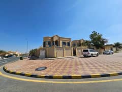 Corner villa for sale in Al Hamidiya area, Ajman, on two Qar streets, consisting of five master rooms