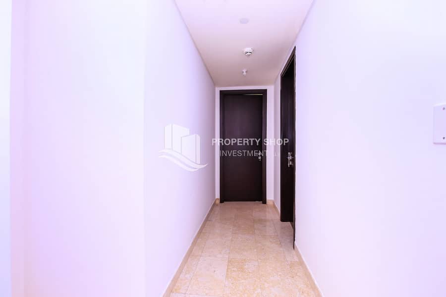 10 2-bedroom-apartment-al-reem-island-marina-square-ocean-terrace-corridor. JPG