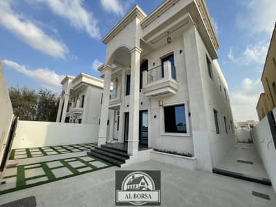 5 Bedroom Villa for Sale in Al Mowaihat, Ajman - A villa for sale in the classic and modern heritage, combining art and beauty, five rooms, a very special location, super deluxe finishing