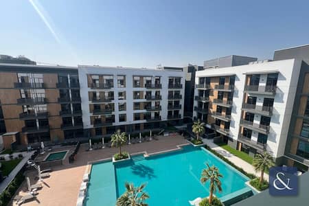 2 Bedroom Apartment for Sale in Jumeirah Village Circle (JVC), Dubai - Pool View | Vacant On Transfer | Motivated Seller