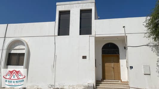 Three-room corner house with air conditioners in Al Sabkha