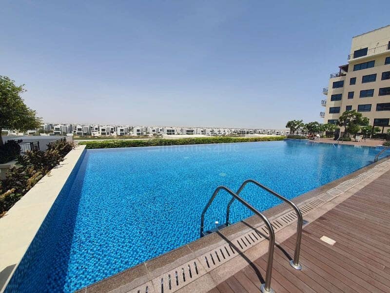 位于迪拜南部街区，艾玛尔南区，高尔夫景观高层豪华住宅 1 卧室的公寓 750000 AED - 8683044