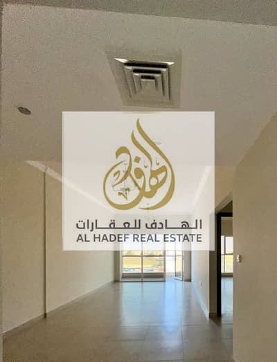 Two rooms and a hall in Ajman, one of the largest spaces in Ajman in the orchard area, free air conditioning with Parkin