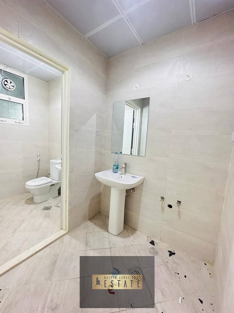 Brand new spacious 1 bedroom hall with 2 bathrooms in Baniyas East