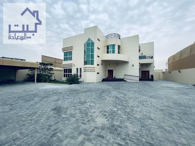 Villa for rent in Al Hamidiya area, Ajman, 6 master rooms, a sitting room, a hall, and a maids room