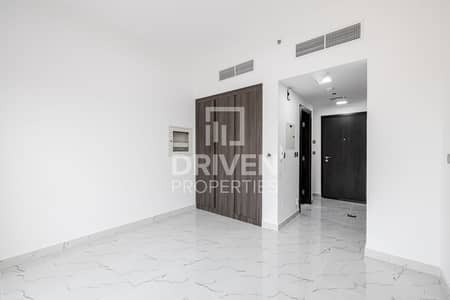 Studio for Sale in Dubai Residence Complex, Dubai - Brand New & Bright | High Floor | Vacant