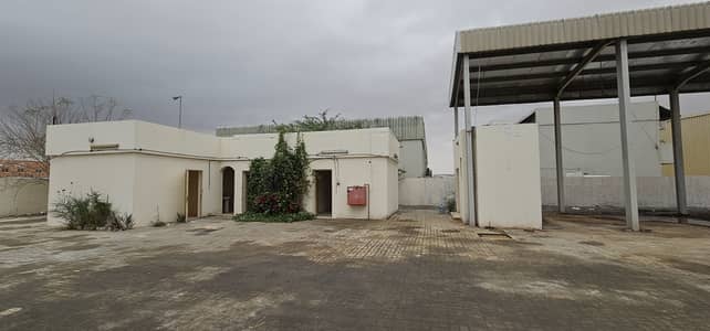 Industrial Land for Rent in Al Sajaa, Sharjah - INTERLOCKED YARD WITH 30 KW POWER FOR RENT