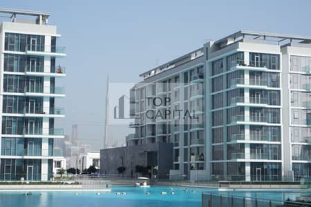 CRYSTAL LAGOONS VIEW |STUNNING SEMI-FURNISHED 1 BR
