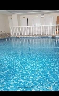 For annual rent in Ajman, two rooms, a large hall, two separate rooms, a separate kitchen, and two bathrooms. The rooms are master with a gym and a fr