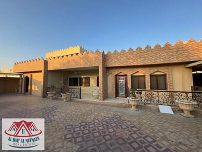six-room, three-kitchen villa on the main street in Al-Ghafia