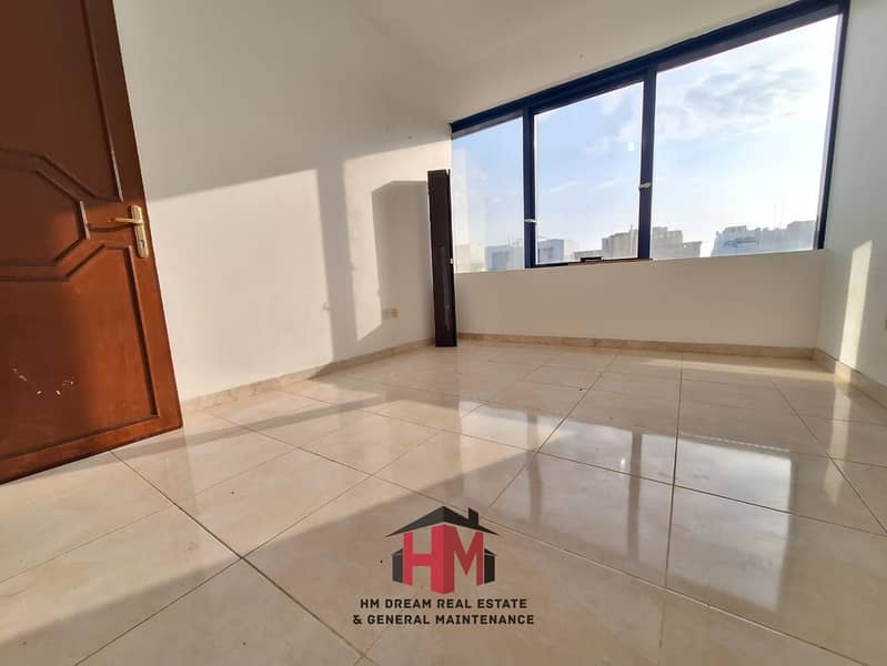 Fantastic and Very Spacious Two Bedroom Hall Apartment with Balcony in Excellent Building at Al Wahdah Abu Dhabi.