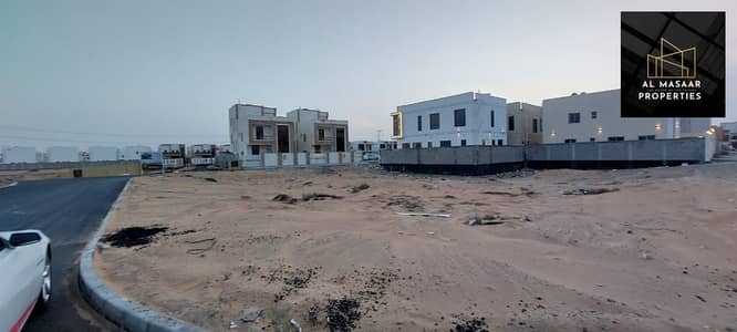 Residential lands for sale, Umm Al Quwain Villas, directly on Al-Raisi Street, including all fees, freehold for all nationalities