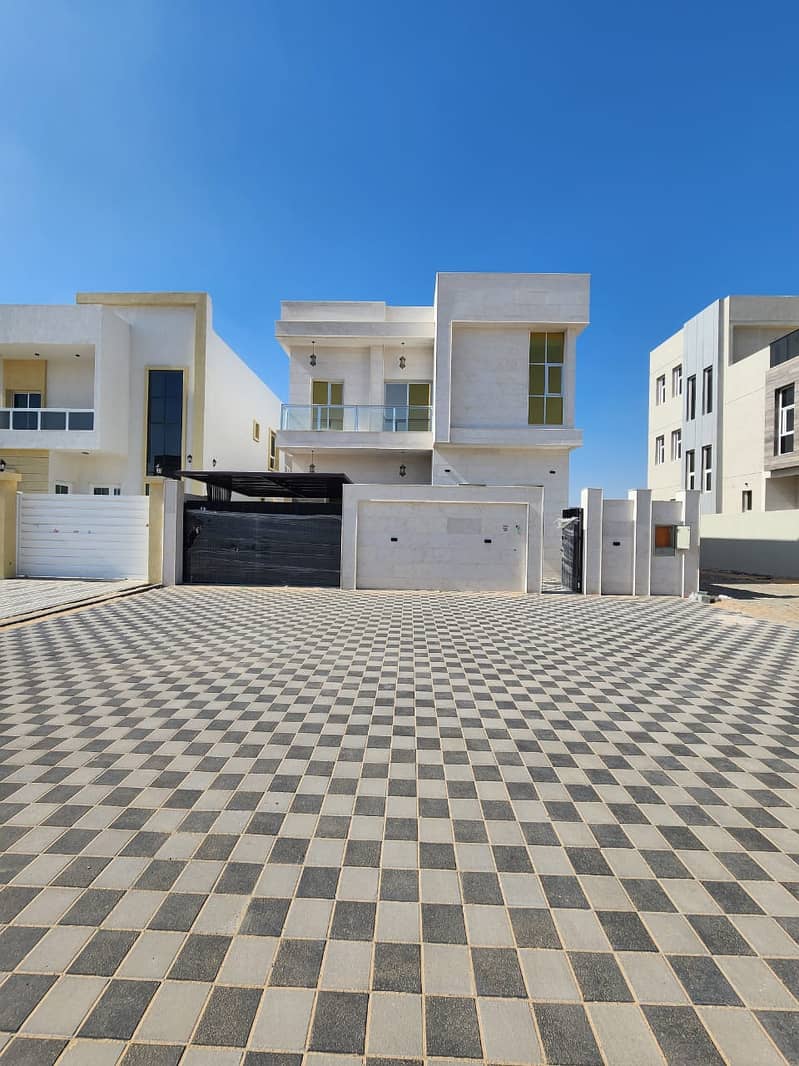 Villa for rent, ground floor + 1, in Al Zahia area, 5 master bedrooms, on Asphalt and Railway Street. . .