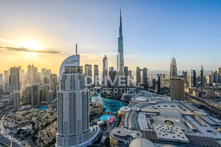 4 Bedroom Apartment for Sale in Downtown Dubai, Dubai - Luxurious with Burj View and Serviced Unit