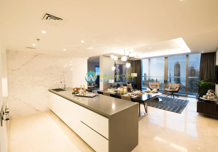 3 The Sterling by OMNIYAT Kitchen with Living. jpg