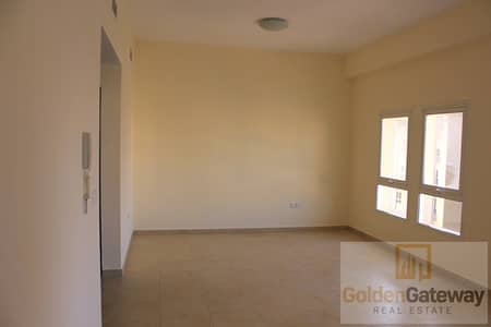 1 Bedroom Flat for Rent in Remraam, Dubai - Living hall. JPG
