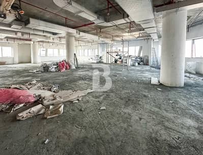 Office for Rent in Motor City, Dubai - AUTODROME VIEW| SHELL AND CORE| FULL FLOOR