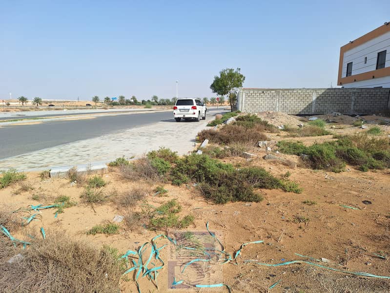 Land on the corner of two streets for sale in Ajman, Al Aliyah area, freehold, area 3014 feet, G+2, at an excellent price