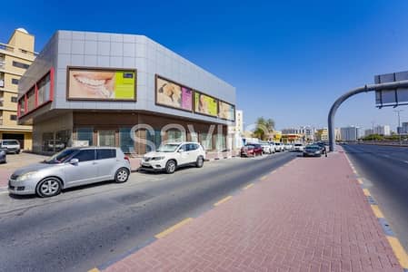 Building for Rent in Al Rashidiya, Ajman - Main road / Mixed use / Prime location