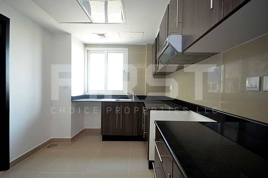 13 Internal Photo of 3 Bedroom Apartment Closed Kitchen in Al Reef Downtown Al Reef Abu Dhabi UAE (22). jpg